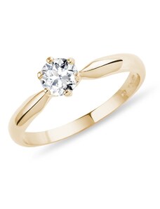 Zlatý zásnubný prsteň s briliantom KLENOTA K0191053