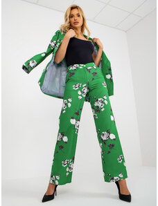 Fashionhunters Zelené široké látkové nohavice s kvetmi z obleku