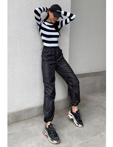 Trend Alaçatı Stili Dámske čierne nohavice s vysokým pásom a elastickým pásom s dvojitým vreckom z padavej tkaniny na jogging