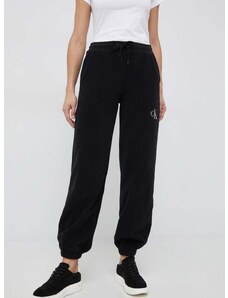Tepláky Calvin Klein Jeans dámske, čierna farba, s nášivkou
