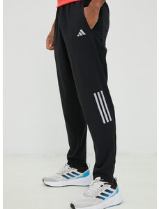 Bežecké nohavice adidas Performance Own the Run pánske, čierna farba, s potlačou