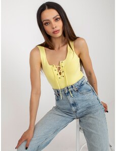 Fashionhunters Light yellow women's top with lace-up neckline