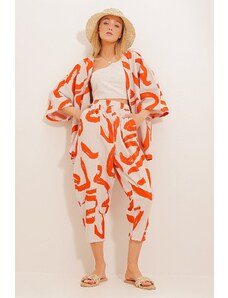 Trend Alaçatı Stili Dámske vrecovité nohavice s oranžovým vzorom a súprava kimon