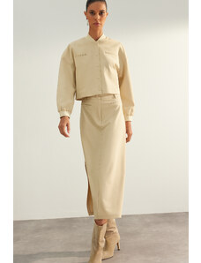 Trendyol Collection Béžová limitovaná edícia vysokokvalitná umelá koža detailne tkaná midi sukňa