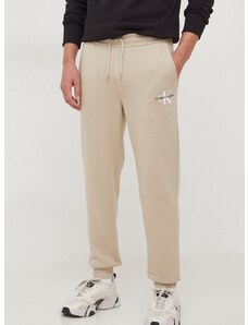 Tepláky Calvin Klein Jeans béžová farba,s potlačou,J30J324685
