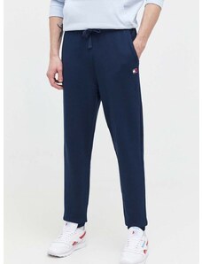 Bavlnené tepláky Tommy Jeans tmavomodrá farba,jednofarebné,DM0DM18355