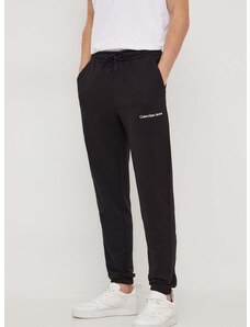 Bavlnené tepláky Calvin Klein Jeans čierna farba,jednofarebné,J30J324739