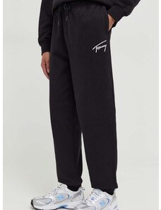 Bavlnené tepláky Tommy Jeans čierna farba,jednofarebné,DM0DM18356