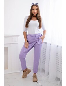 Kesi Trousers tied with an asymmetrical light purple front