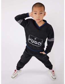 Detské nohavice HUGO tmavomodrá farba, jednofarebné