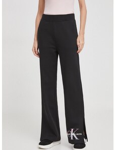 Bavlnené tepláky Calvin Klein Jeans čierna farba,s potlačou,J20J223422