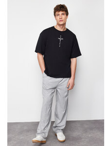 Trendyol Collection Čierne oversize/široký strih načechraný text s potlačou 100% bavlna tričko