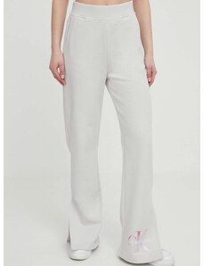 Bavlnené tepláky Calvin Klein Jeans šedá farba,s potlačou,J20J223422