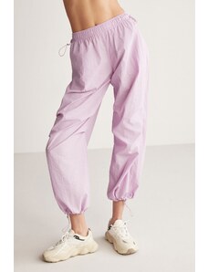GRIMELANGE Dámske vodotesné padákové nohavice Kelsey s detailným fialovým uzáverom