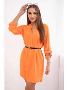 Kesi Dress with a longer back and an orange-colored belt