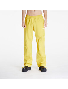 Pánske šusťákové nohavice Nike x NOCTA x L'ART DE L’AUTOMOBILE Men's Tech Pants Vivid Sulfur/ Sail