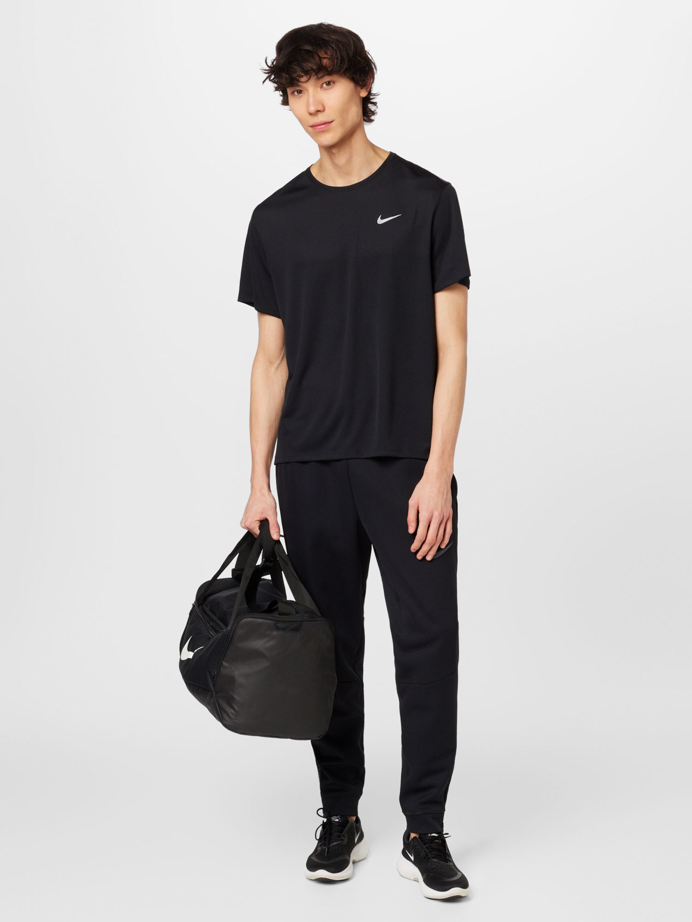 NIKE Funkčné tričko 'Miler' čierna / biela