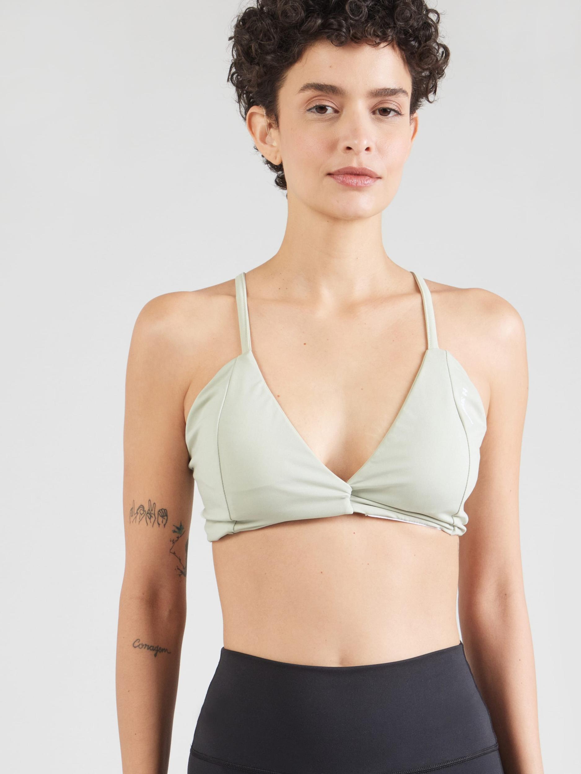 NEBBIA Športová podprsenka pastelovo zelená / biela