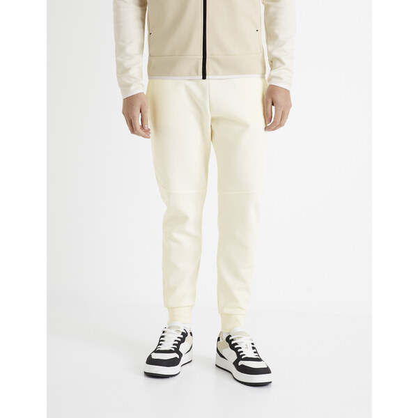 Nohavice a kraťasy pre mužov Celio - krémová 50532349