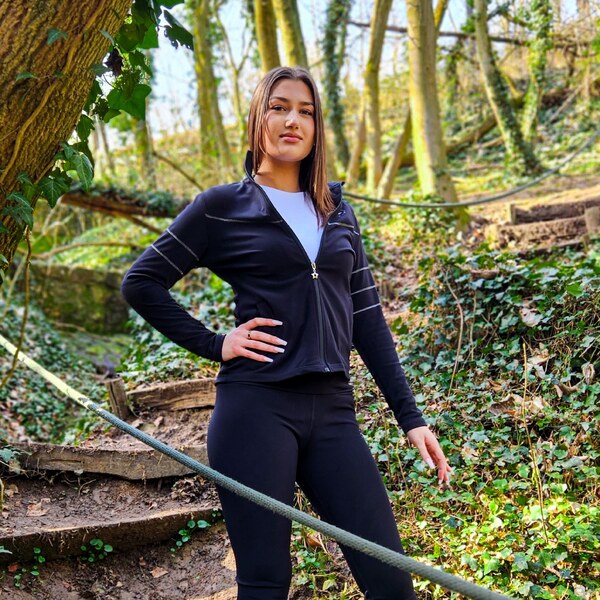 TERMOVEL Čierna dámska mikina so striebornými detailmi 57808594