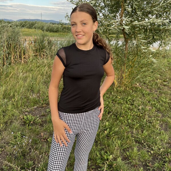 TERMOVEL Čierne dievčenské športové tričko s krátkym rukávom 57962928