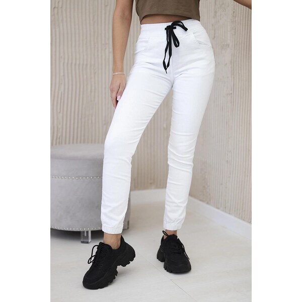 MladaModa Džínsové nohavice so sťahovacou šnúrkou v páse model 5569 63034461