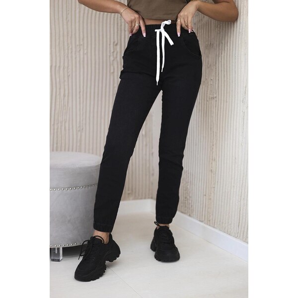 MladaModa Džínsové nohavice so sťahovacou šnúrkou v páse model 5569 63034460