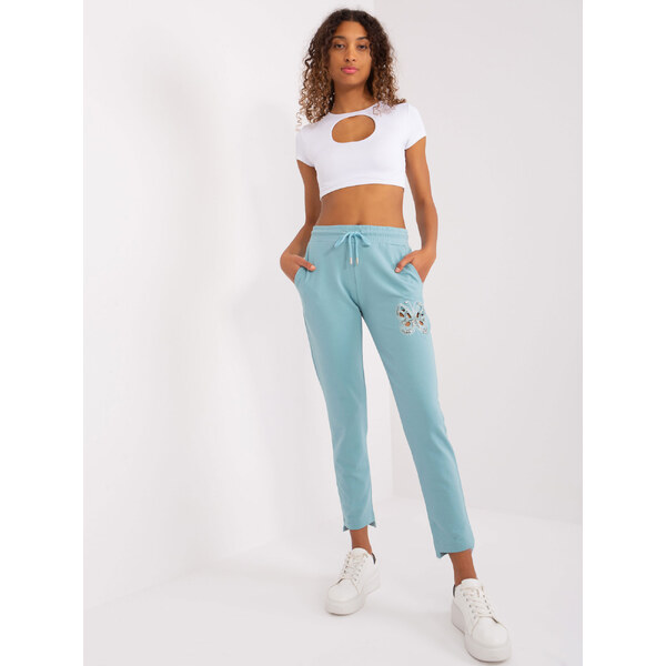 RELEVANCE Mintové dámske tepláky s kamienkovým motýľom -RV-DR-8835.10 57954469