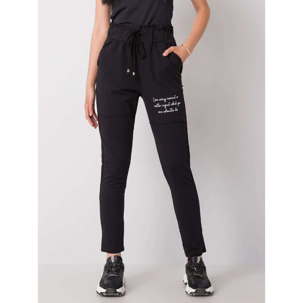 RELEVANCE Čierne dámske tepláky s nápisom RV-DR-6712.28P-black 59552765