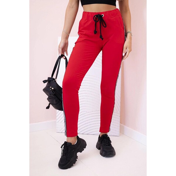 MladaModa Teplákové nohavice s pruhom na boku a viazaním v páse model 64149869