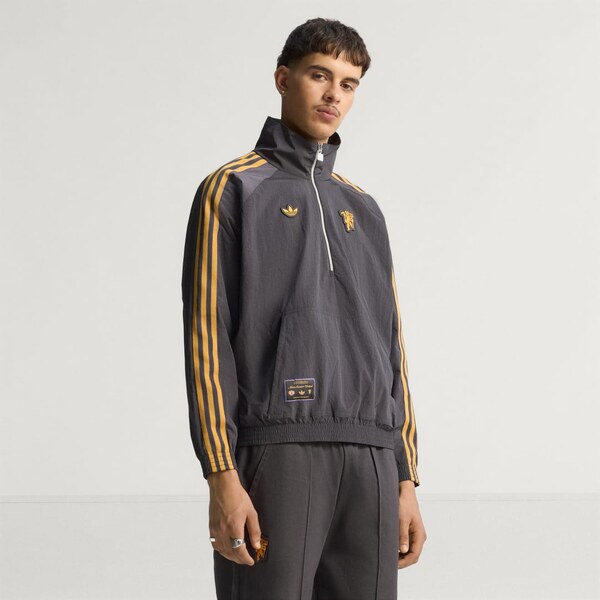 Adidas Bunda Manchester United Terrace Icons spolovičným zipsom 65026631