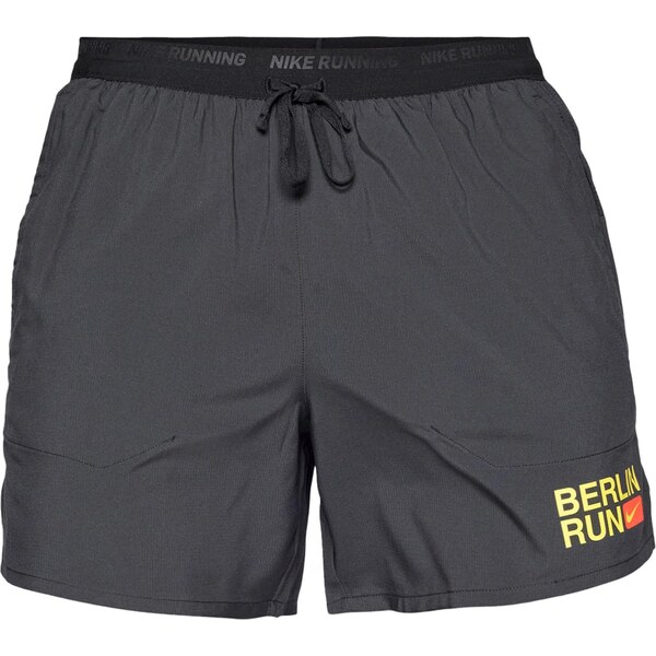 NIKE Športové nohavice CITY MRTH STRIDE tmavožltá / červená / čierna 65893620