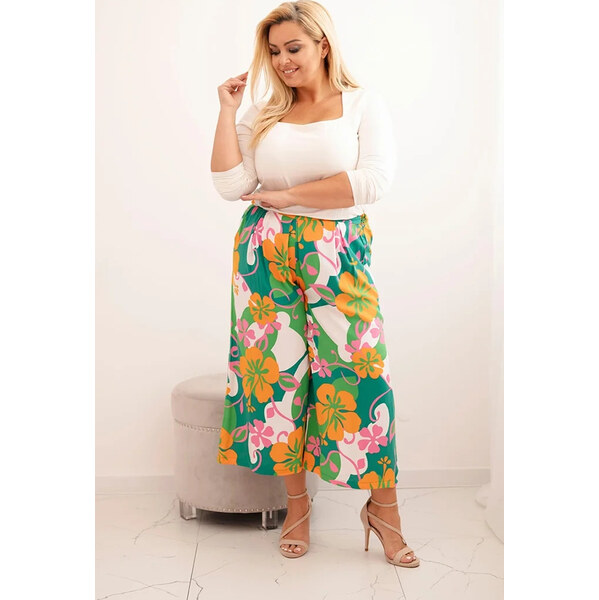 Kesi Oranžové dámske plus size nohavice z viskózy s kvetinovým vzorom 65691242