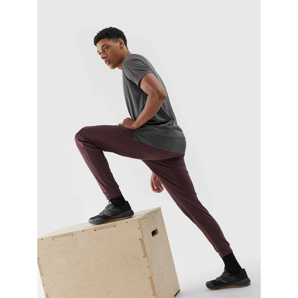 Pánske športové rýchloschnúce nohavice 4F - hnedé 57085652