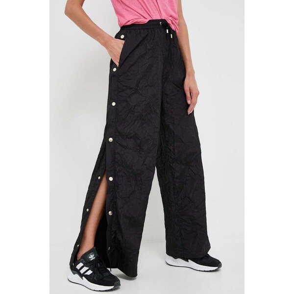 Nohavice P.E Nation 48505240