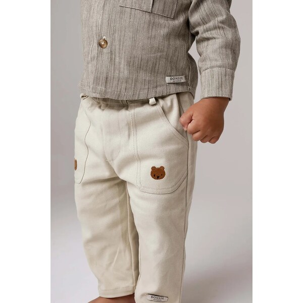 Detské bavlnené nohavice Donsje Kassim Trousers Bear 62478679