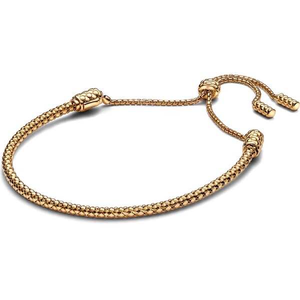 PANDORA Posuvný pozlátený náramok s cvočkami 58186329