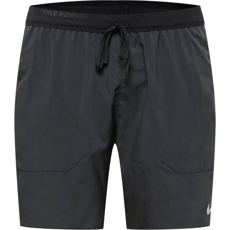 NIKE Športové nohavice sivá / čierna 33609874