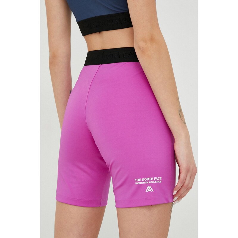 Športové krátke nohavice The North Face Mountain Athletics dámske, fialová farba, jednofarebné, stredne vysoký pás