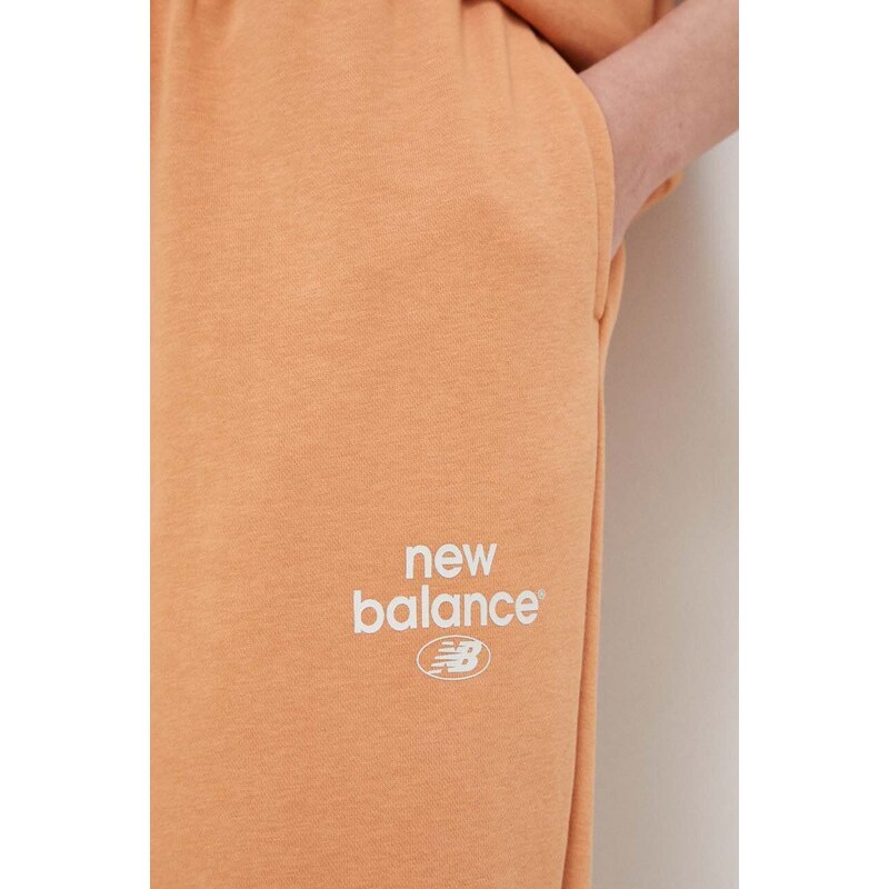 Tepláky New Balance WP31508SEI-SEI, oranžová farba, s potlačou