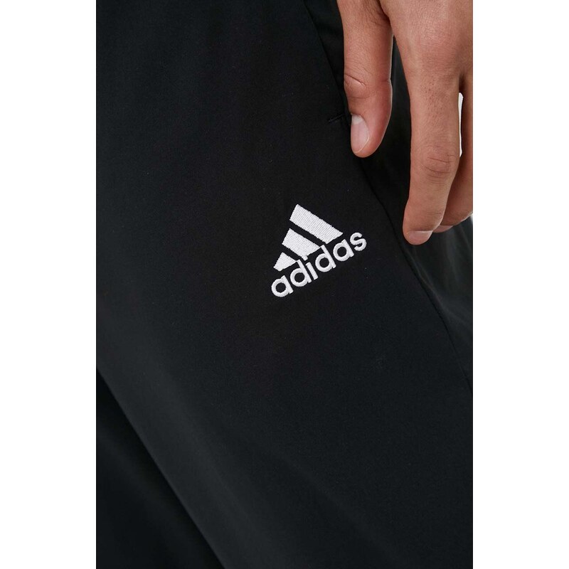 Tréningové nohavice adidas Essentials Stanford čierna farba, s nášivkou