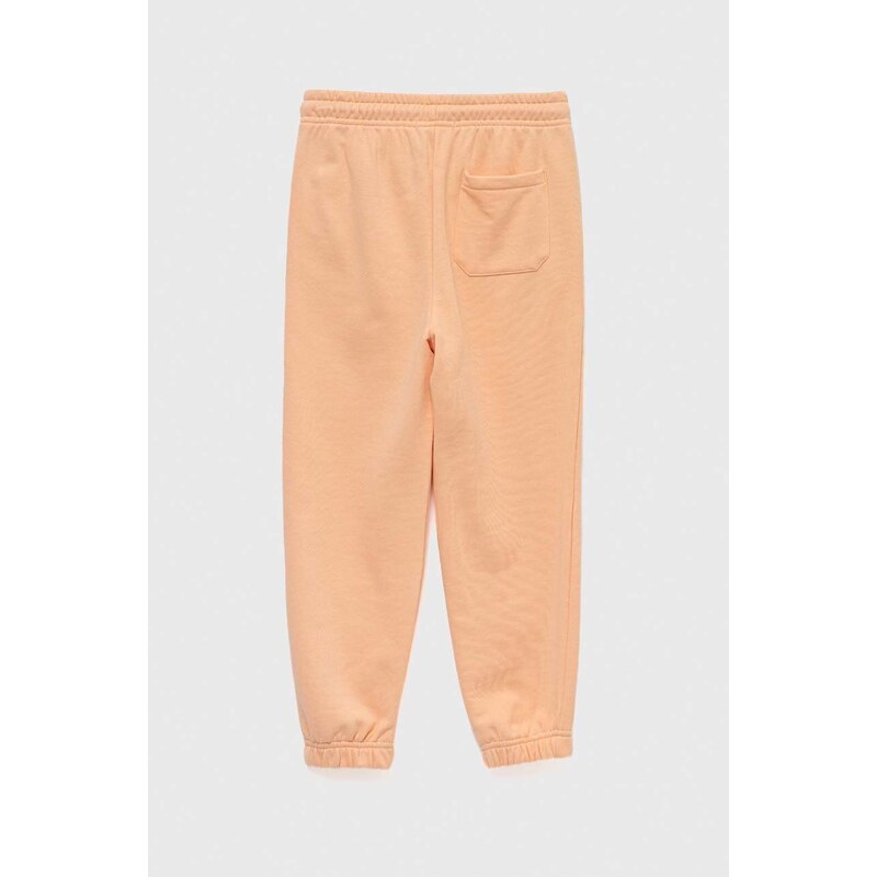 Detské tepláky Calvin Klein Jeans oranžová farba, jednofarebné