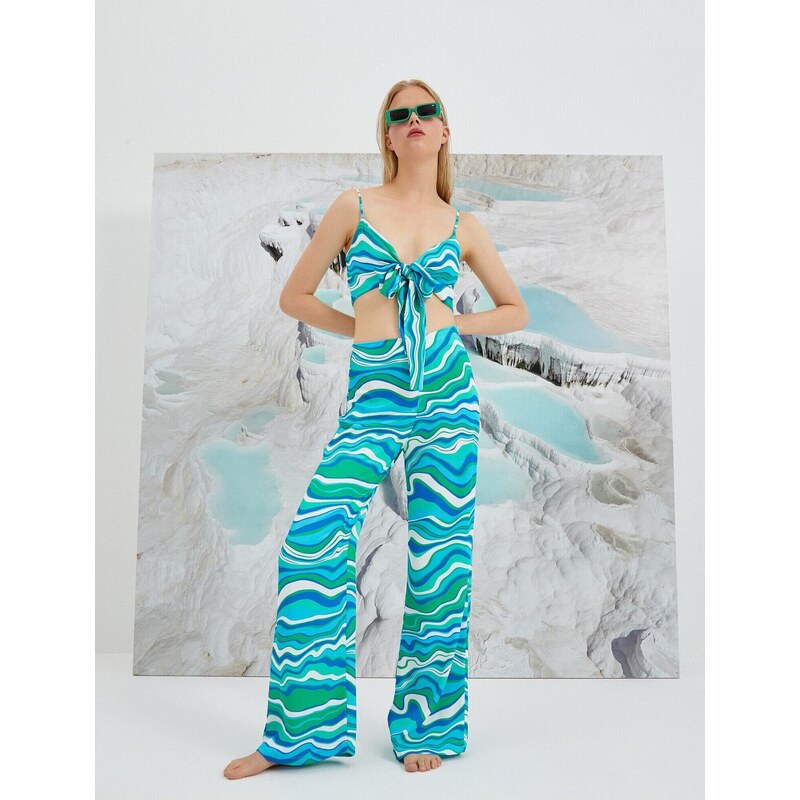 Koton Şahika Ercümen X - vzorované široké nohavice 50679746