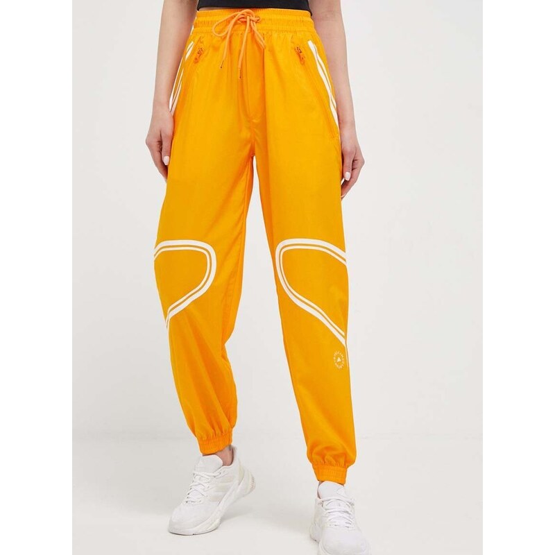 Tréningové nohavice adidas by Stella McCartney TruePace oranžová farba, s potlačou