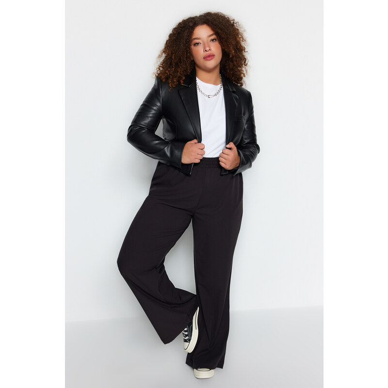 Trendyol Curve čierne splývavé tkané nohavice širokého strihu 50614318