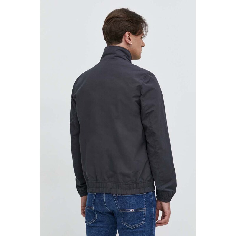 Bunda Tommy Jeans pánska,šedá farba,prechodná,DM0DM15382