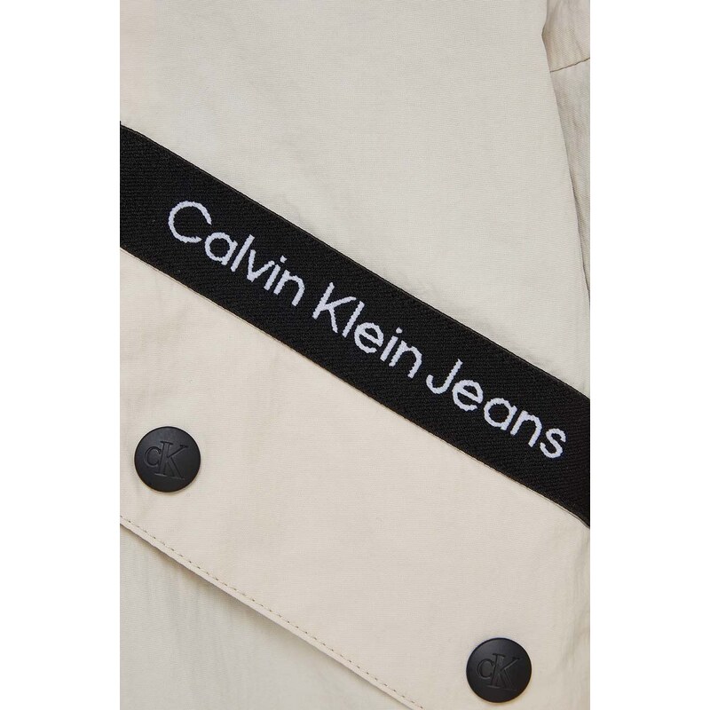 Detská bunda Calvin Klein Jeans béžová farba