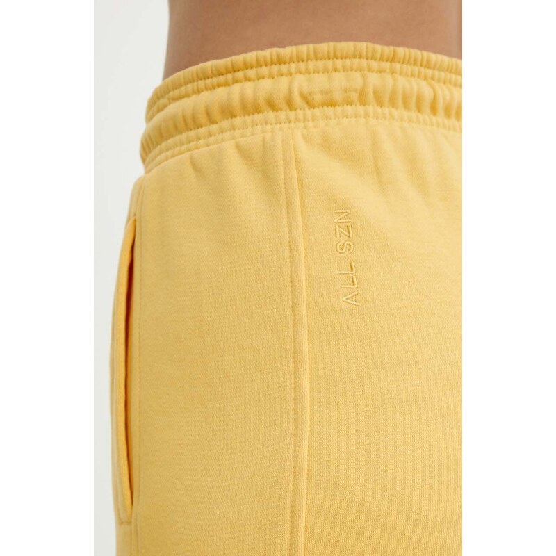 Šortky adidas dámske, žltá farba, jednofarebné, vysoký pás, IW1259