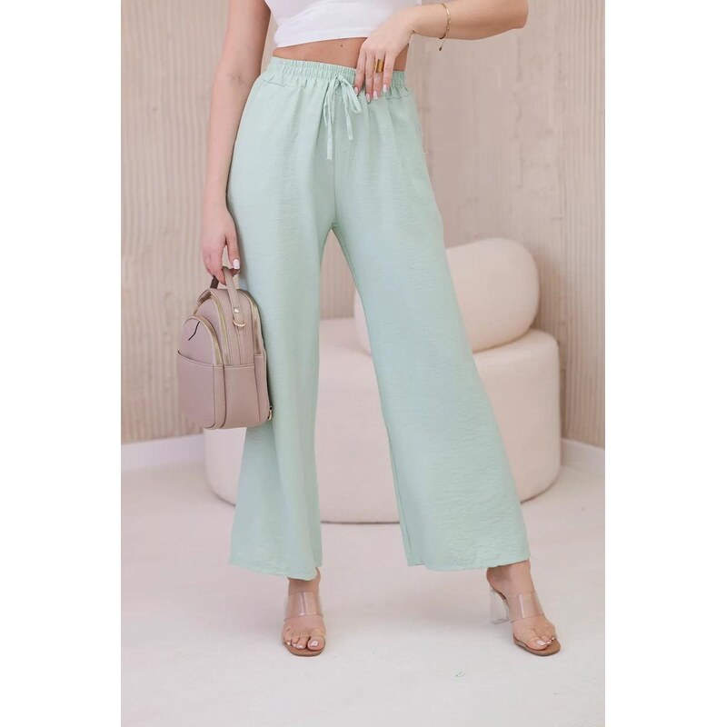 MladaModa Široké viskózové nohavice viazané v páse model 6695R svetlé 63034531