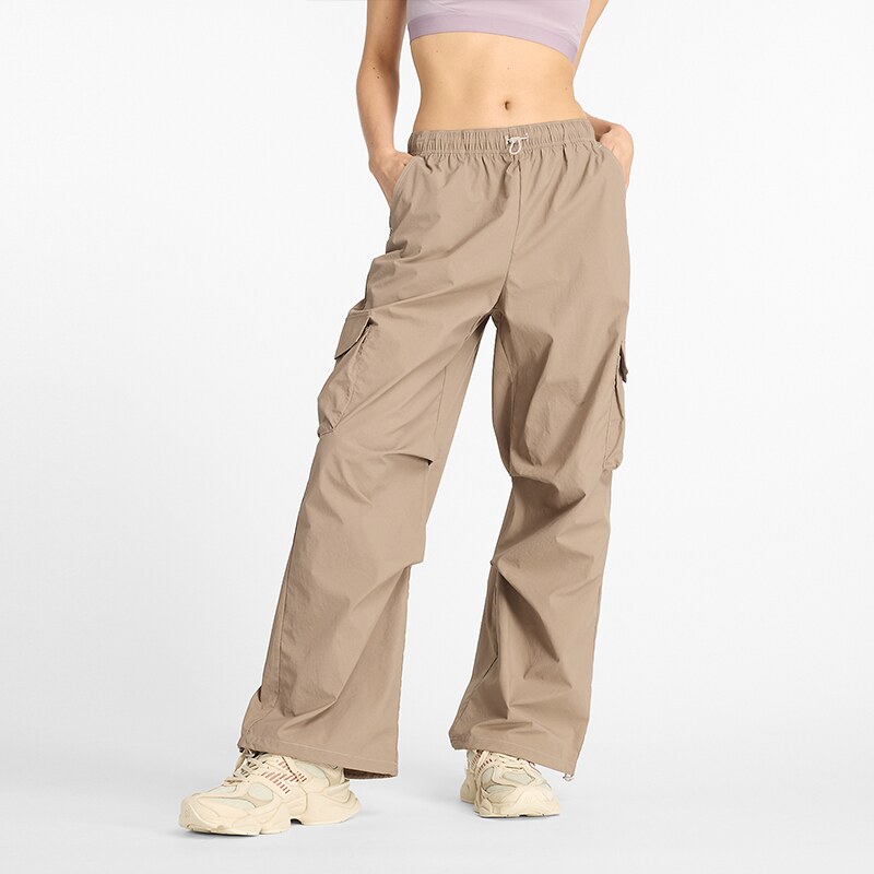 Dámske nohavice New Balance WP43534LMR – béžové 57084026